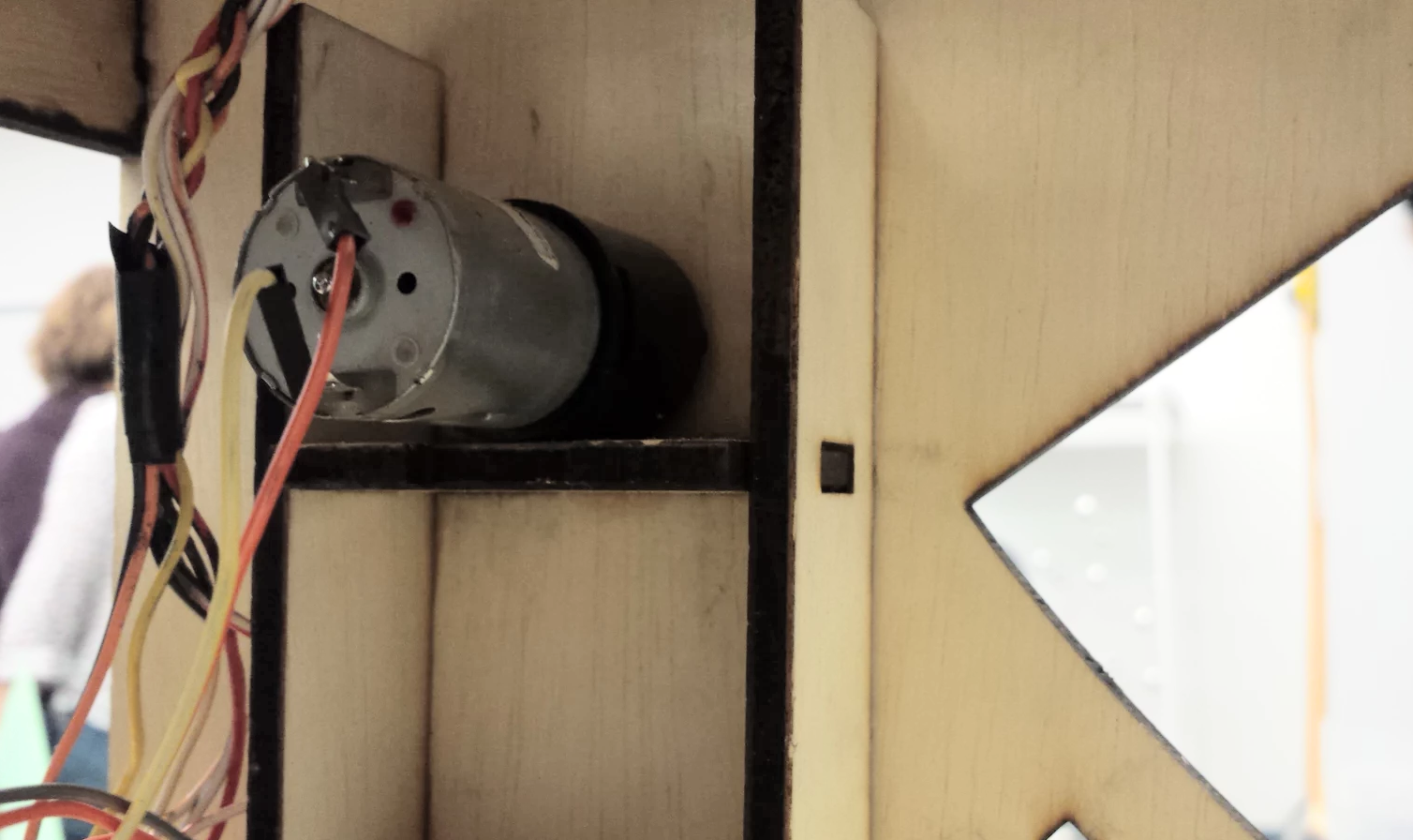 A photo of our DC motor driving our wheel.